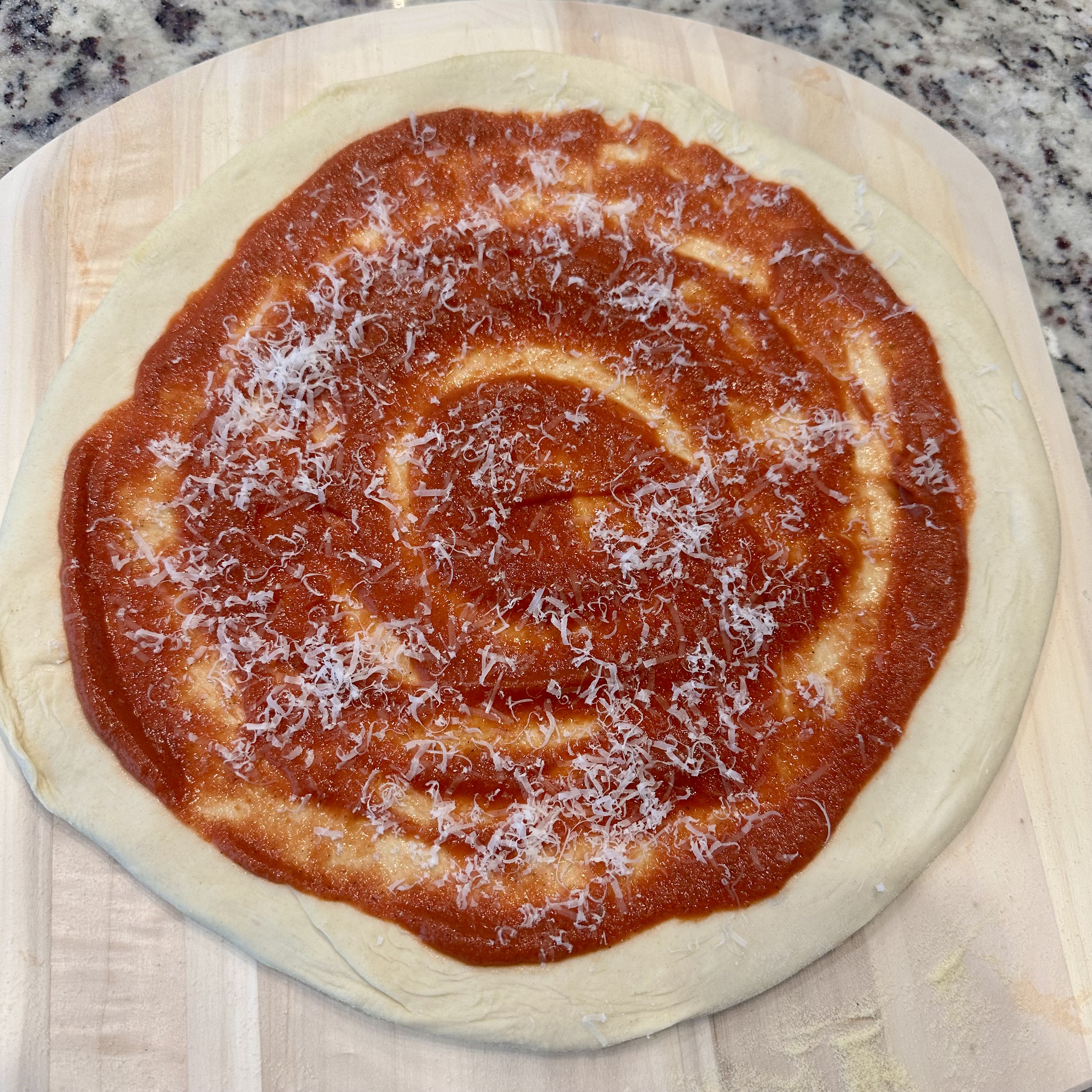 May 1st - Pizza dough after saucing